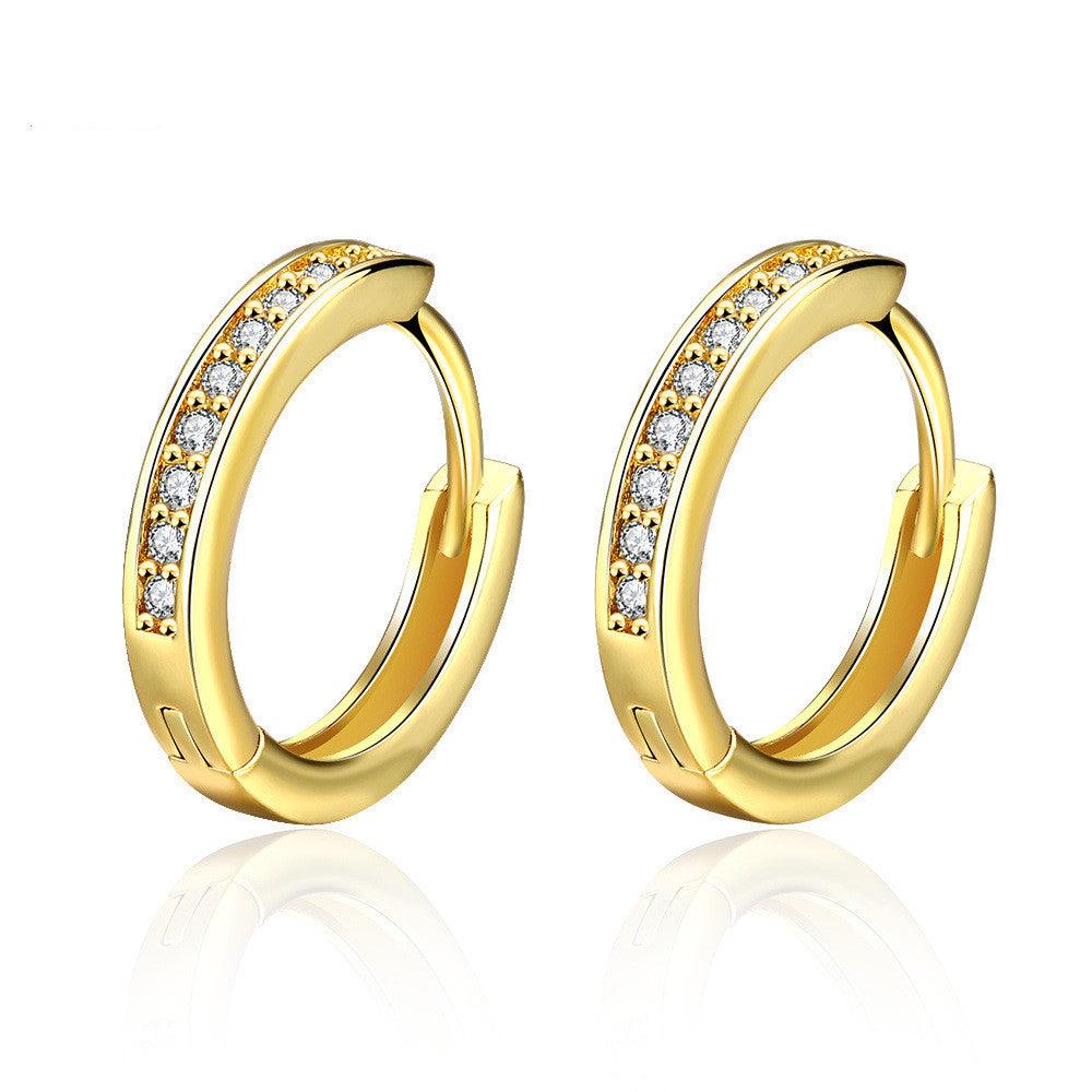 Goldene Creolen Ohrringe mit funkelnden Zirkonia Steinen Gold